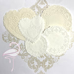 Selection of 26 round and heart, doilies, white and ivory