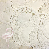 Selection of 26 round and heart, doilies, white and ivory